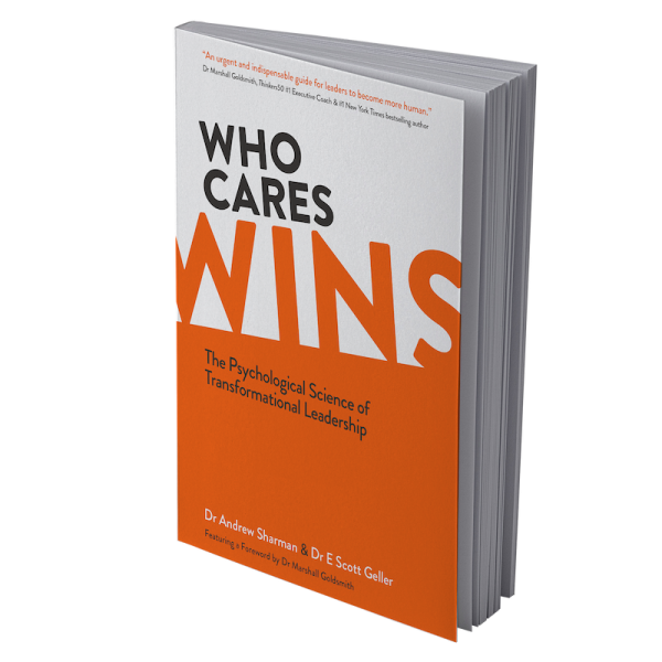 he image shows a book titled "WHO CARES WINS" with the subtitle "The Psychological Science of Transformational Leadership." The book is authored by Dr. Andrew Sharman and Dr. E. Scott Geller, with a foreword by Dr. Marshall Goldsmith. The cover features a white and orange color scheme, with "WHO CARES" in black text and "WINS" in large orange text. At the top of the cover is a quote that reads: "An urgent and indispensable guide for leaders to become more human." - Dr. Marshall Goldsmith, Thinkers50 #1 Executive Coach & #1 New York Times bestselling author.
